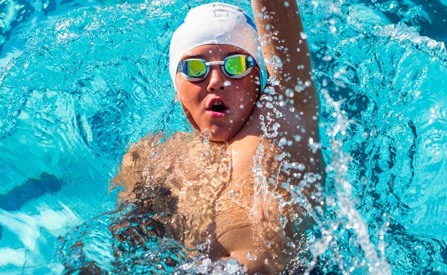 Age Group Backstroke Swimmer White Cap