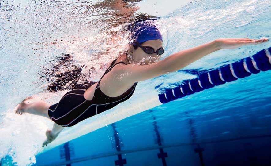 Female Freestyle Swimmer Blue Cap