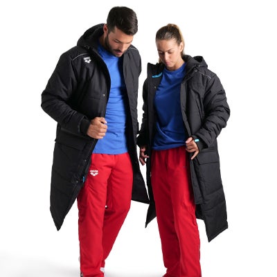 Get ready for fall & winter training with our team line parka. New this season, this classic cover-up is cut from a high-tech waterproof fabric and is padded for extra warmth. Smart details like a generous drawstring hood, concealed fastening, and ribbed cuffs improve insulation and warmth while the large front flap pockets are perfect for your personal items and technology. Comfortably confront the crisper temperatures in this sleek logo-stamped jacket.|https://www.arenasport.com/en_us/004914-team-parka-solid.html|0|itw4